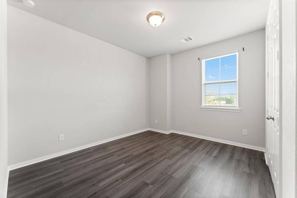 Front Bedroom, New LVP Flooring, Views of Front Yard and Cul de Sac, Neutral Paint