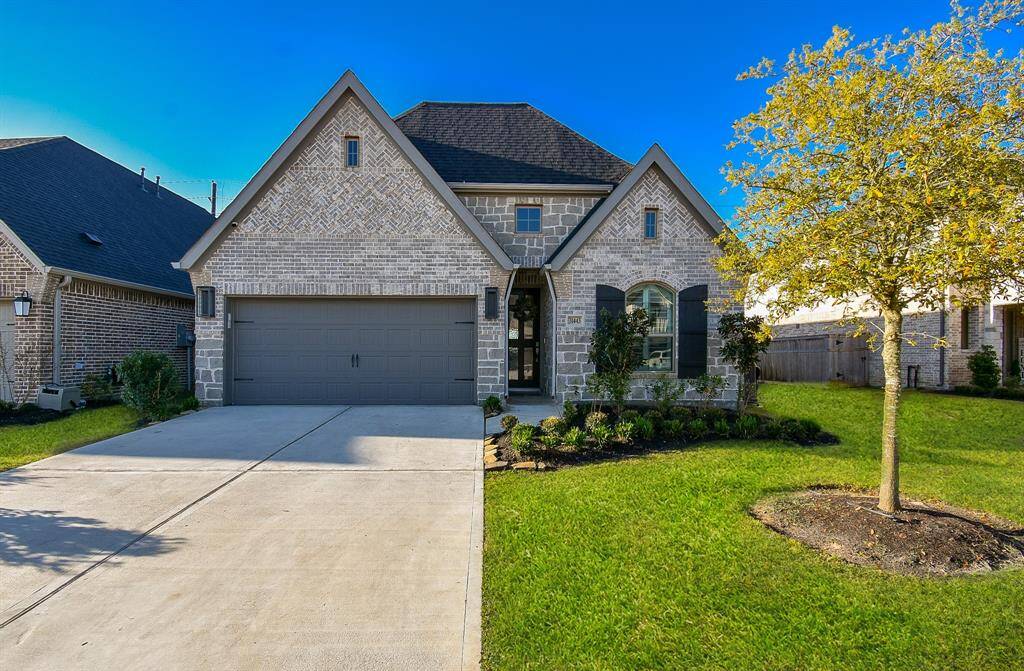 Perry Homes 2188W has 4 sides brick/stone exterior This lovely stone and brick exterior is timeless!