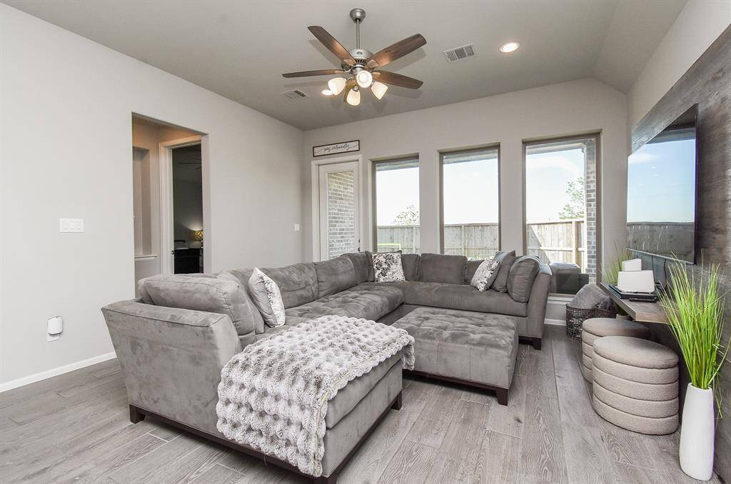 8' Doors with lots of natural light fill this home.