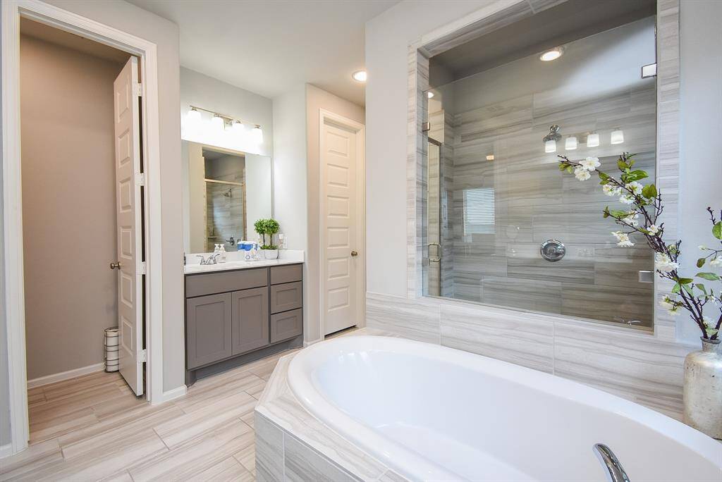 This photo shows water closet one of the vanities and the linen closet!