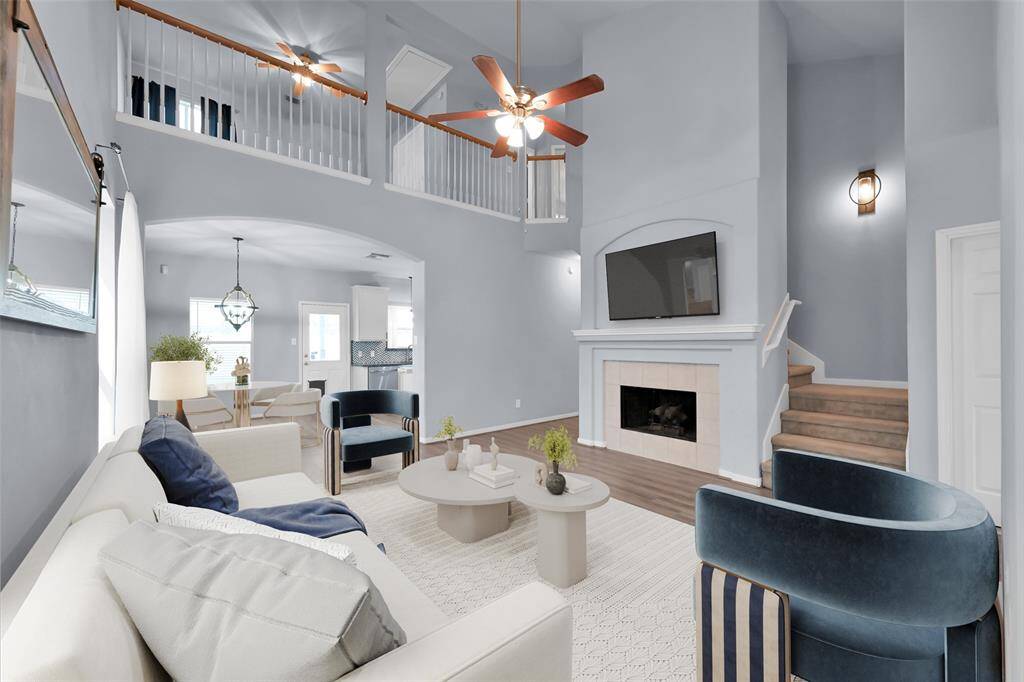 Living room is open to the kitchen and the natural light fills the room! *staged*