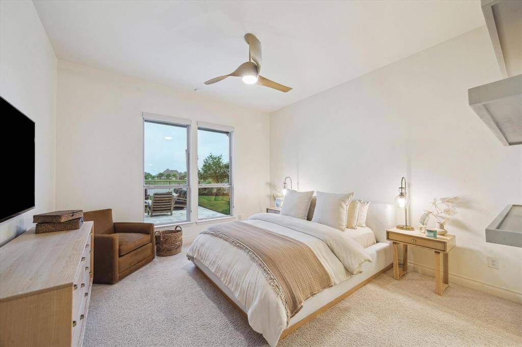 Secondary downstairs bedroom with gorgeous views of the water.