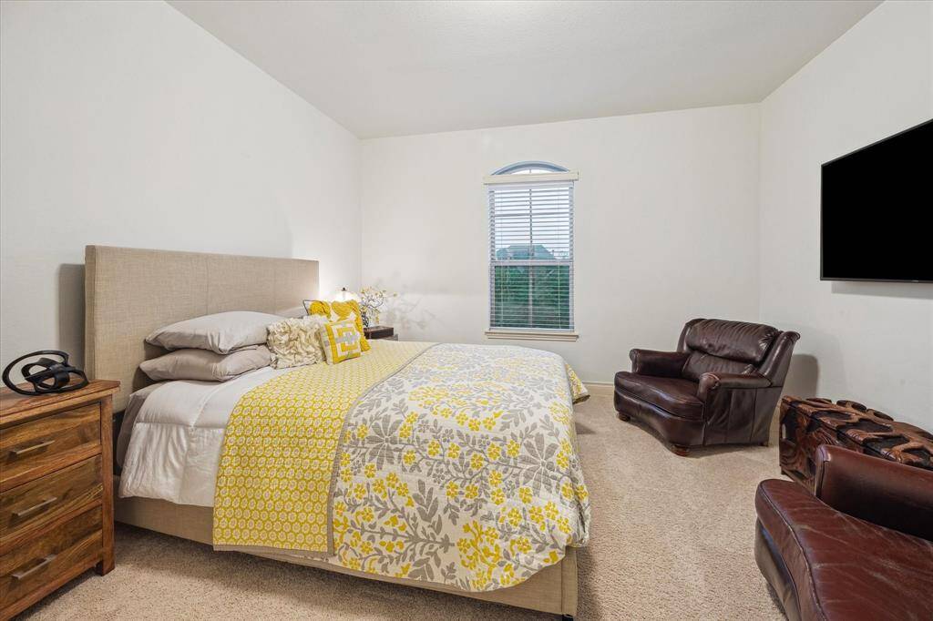Upstairs bedroom withits own en-suite bathroom