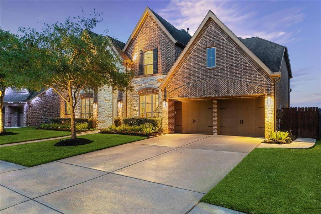 3 attached garage and double wide driveway