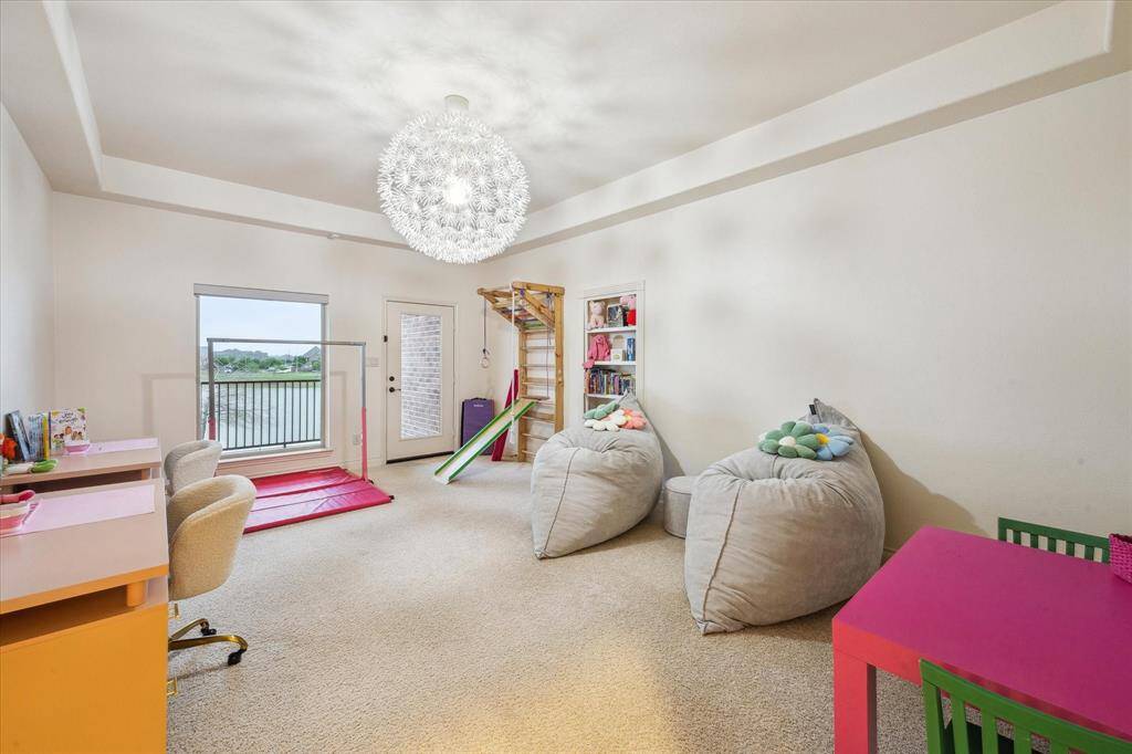 Gameroom with access to upstairs covered patio.