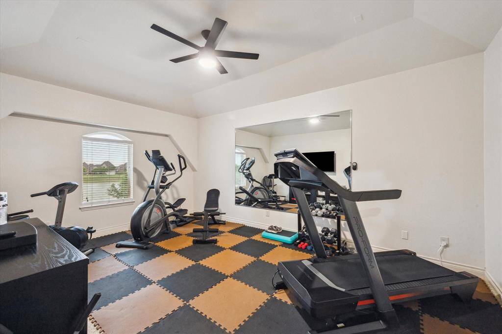 Media room, currently set up as a gym room. Can use for an extra room or office/study.