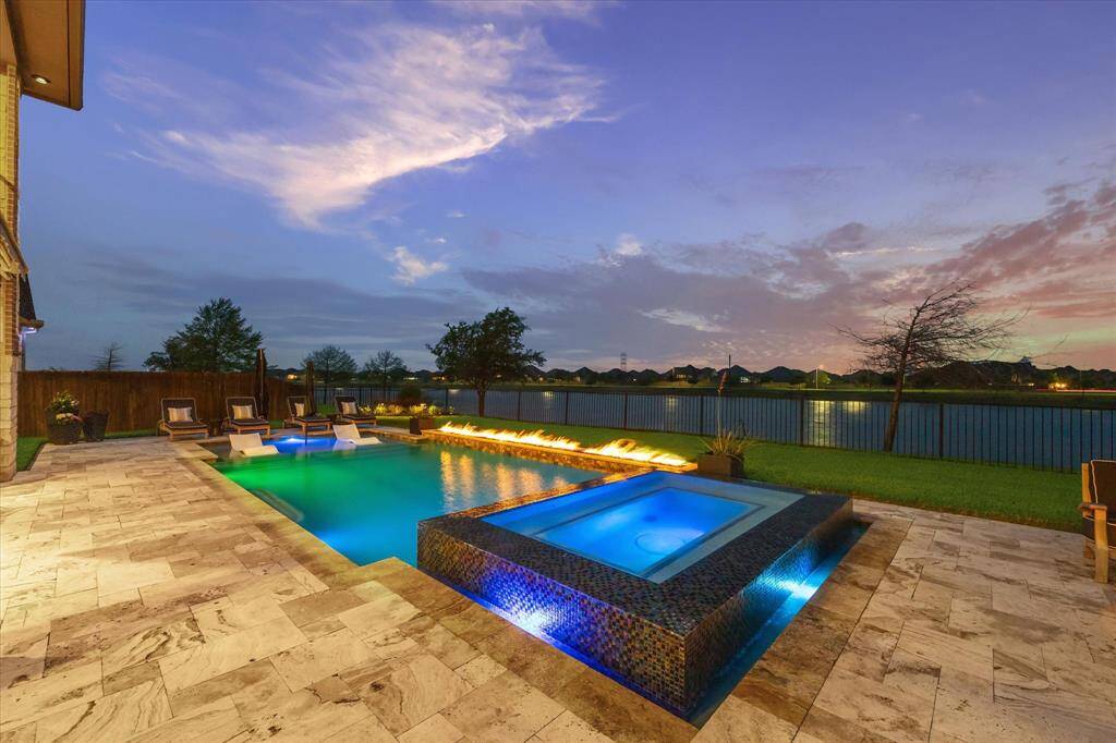 Custom fire features and fountains for the perfect evening ambiance.