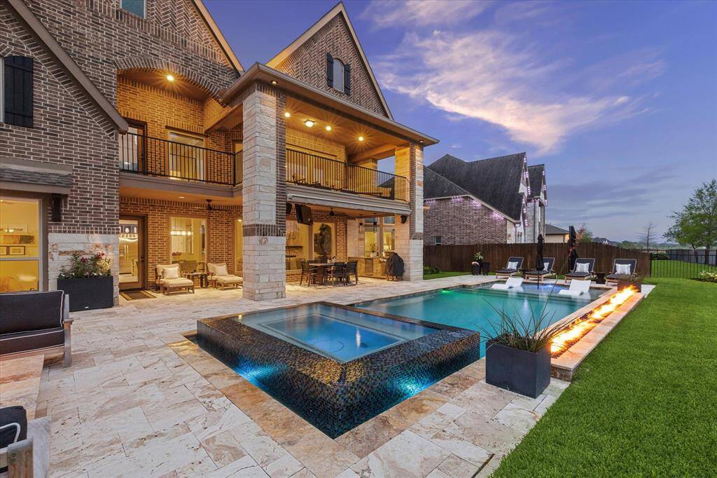 Truly one-of-a kind estate in premier Pearland community