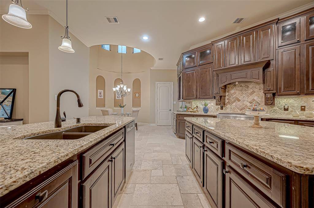 There's plenty of space to prep meals on these beautiful granite countertops, combining style and functionality for the perfect culinary experience!