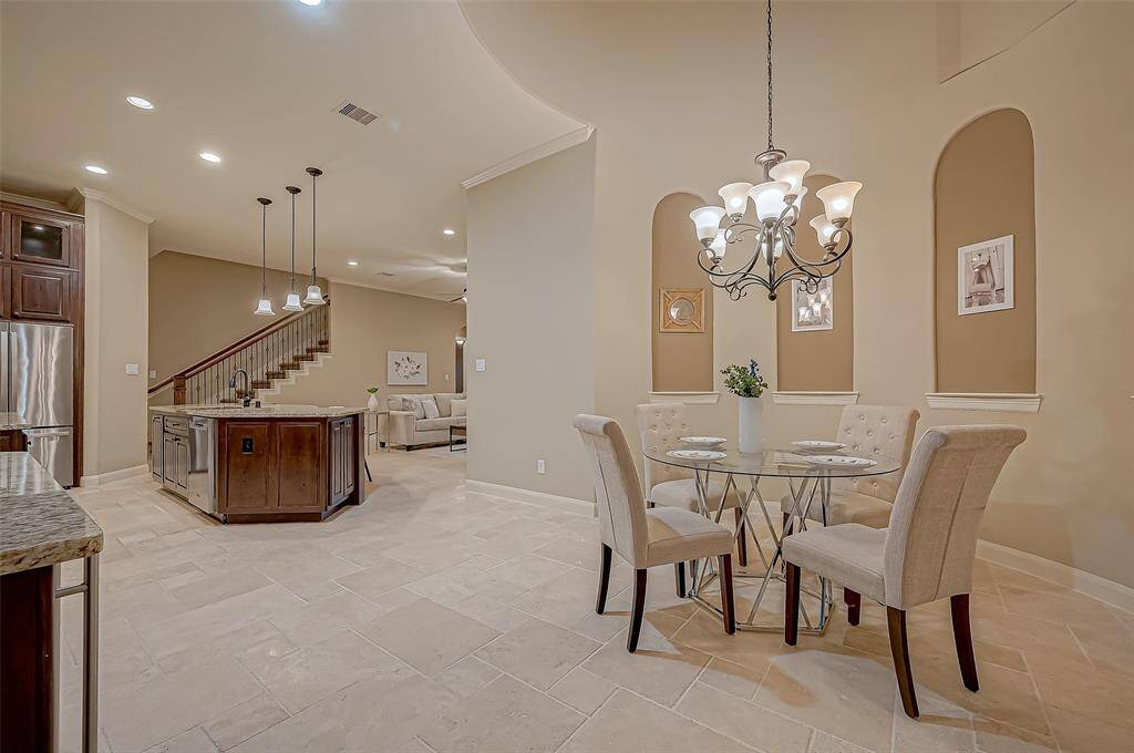 The expansive kitchen and breakfast area offer abundant open space, perfect for effortless dining and entertaining, where guests can gather, and memories can be made!