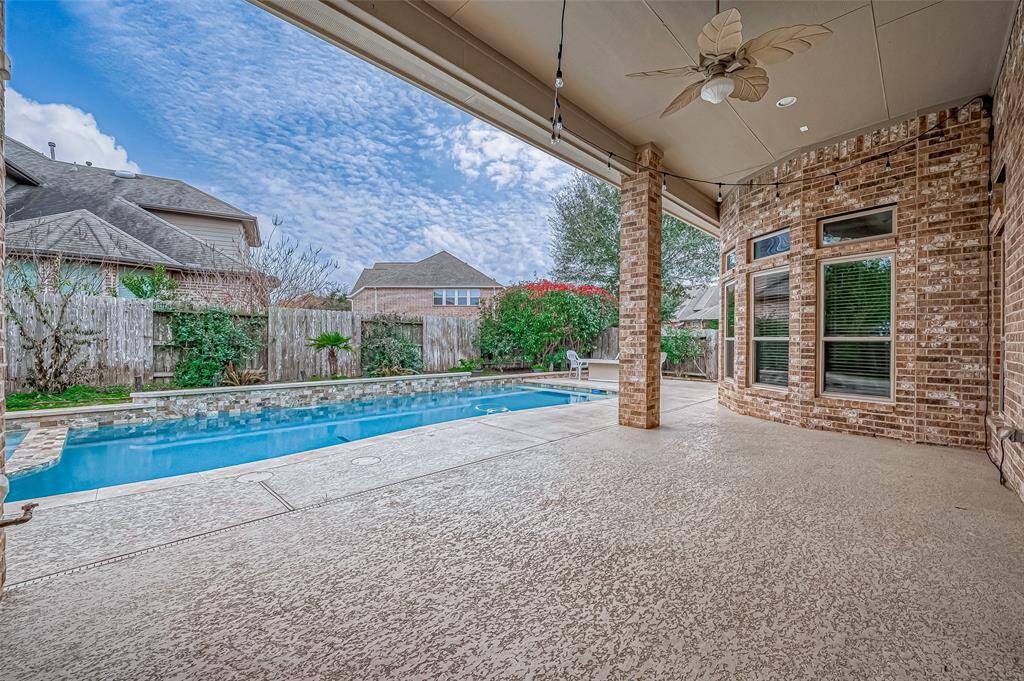 Dine al fresco on the patio, then take a refreshing dip in your stunning pool—perfect for making the most of outdoor living.