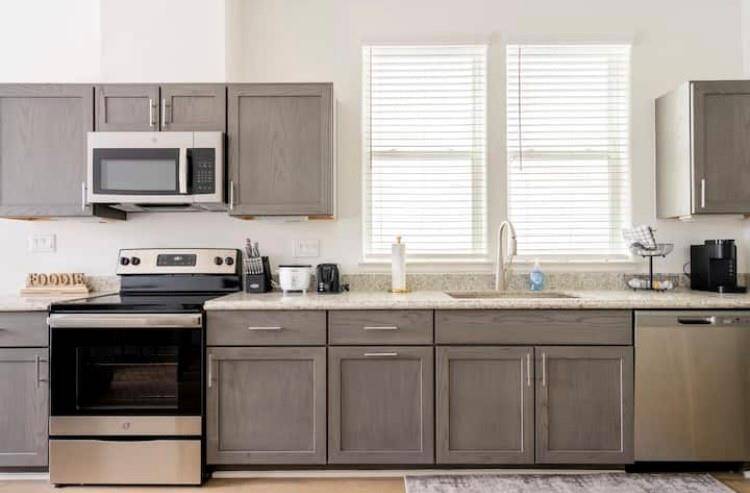 Stainless steel appliances included; granite counter tops