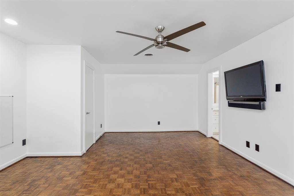 Great room upstairs includes two closets and entry into one of the walk in attics. Space can easily be turned into a 3rd bedroom or office area. Beautiful wood flooring on the second story as well as the first.