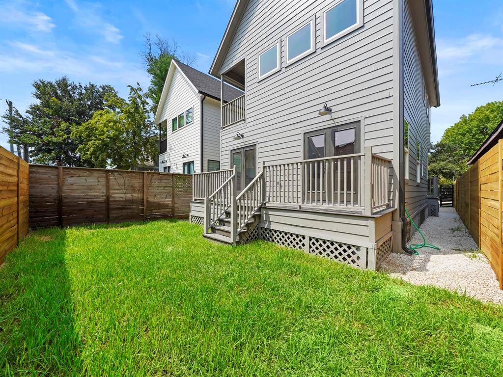 Private, fenced-in backyard offering a secure and spacious outdoor area. Perfect for pets, play, or entertaining, this yard provides a safe and tranquil environment with plenty of room for outdoor activities, gardening, or relaxing in your own private retreat.