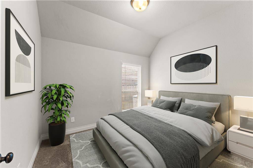 This fourth bedroom enjoys extra sunlight and privacy. A sweet and welcoming space filled with warmth and potential.