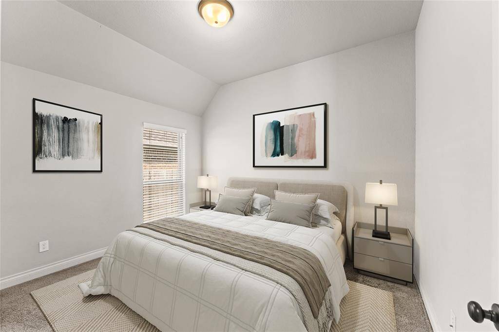 Bright and airy, this  third bedroom is ideal for a creative space, home office, or cozy guest room. Soft lighting and a quiet atmosphere make it easy to focus or unwind.