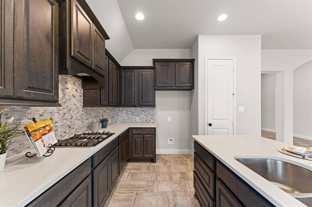 Ample cabinetry offers smart storage for all your cooking essentials.