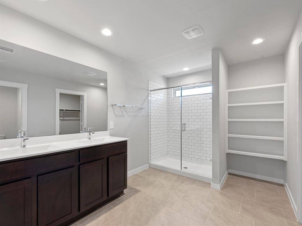 Dual sink vanity with large standup shower