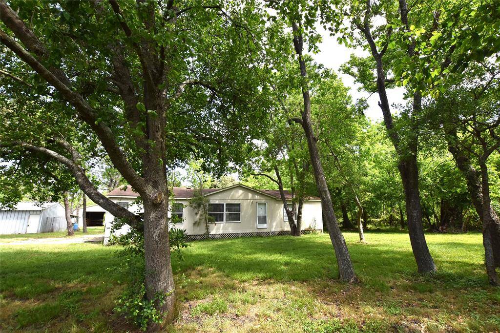 Discover the freedom and space you've been looking for with this 3-bedroom, 2-bath mobile home set on 11.25 acres of unrestricted land.
