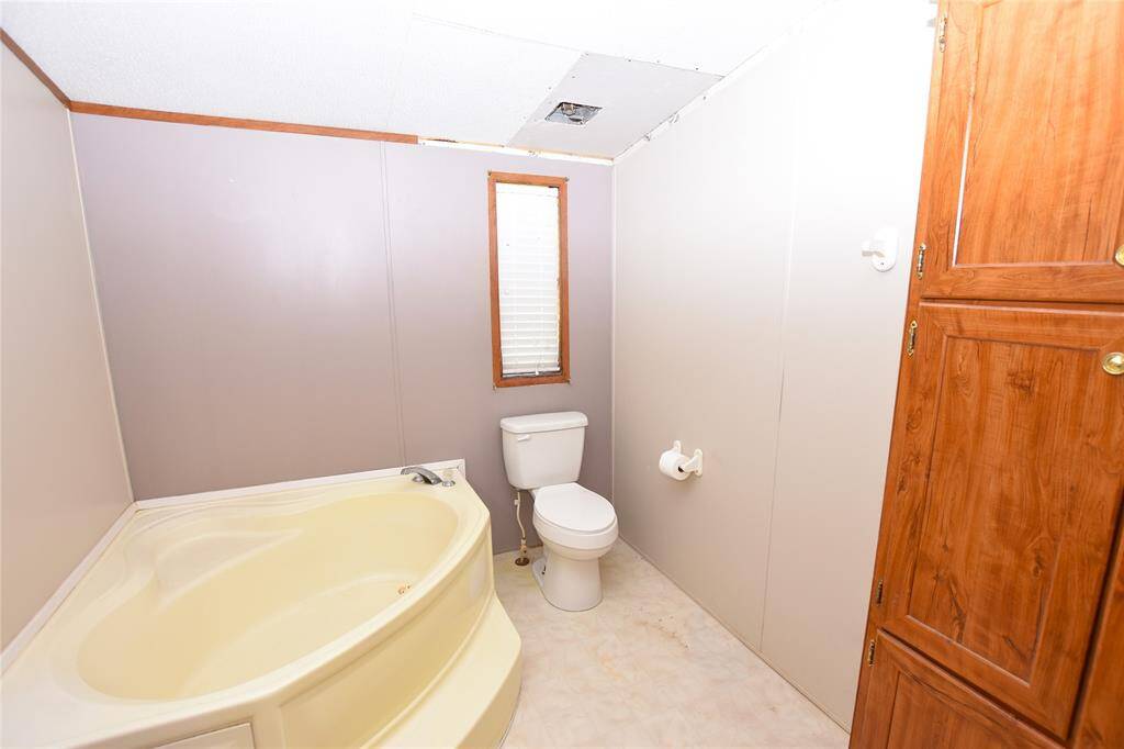 The soaking tub invites you to indulge in a long, relaxing bath, offering a serene escape right in your own home.