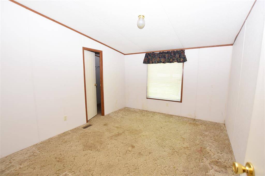 These two spacious secondary bedrooms offer versatile living spaces, perfect for family members, guests, or as home offices.