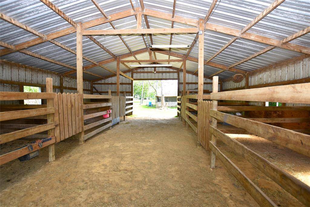 With ample room for multiple stalls, tack storage, and feed areas, it provides a safe, comfortable, and efficient environment for caring for horses.