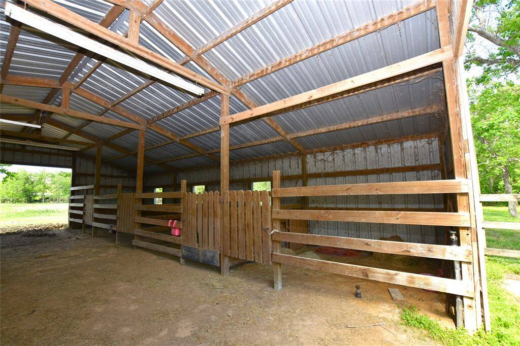 This well-designed, spacious horse barn is a dream for equestrian enthusiasts.