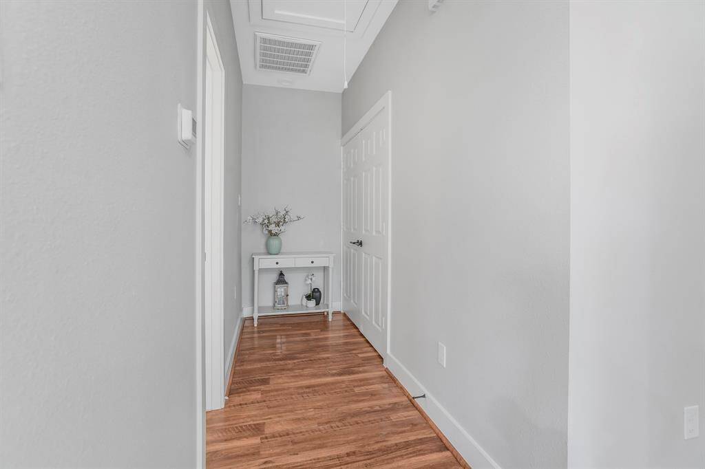 Main hall with laundry on the right. Bathroom on the left