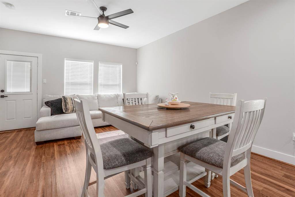 Open dining/living area great for chatting, dining, homework or game nights