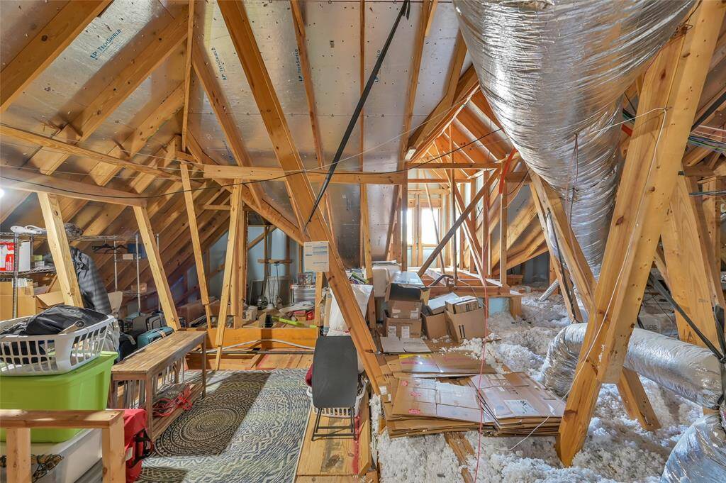 This attic space / Texas basement offers ample room for extra storage.