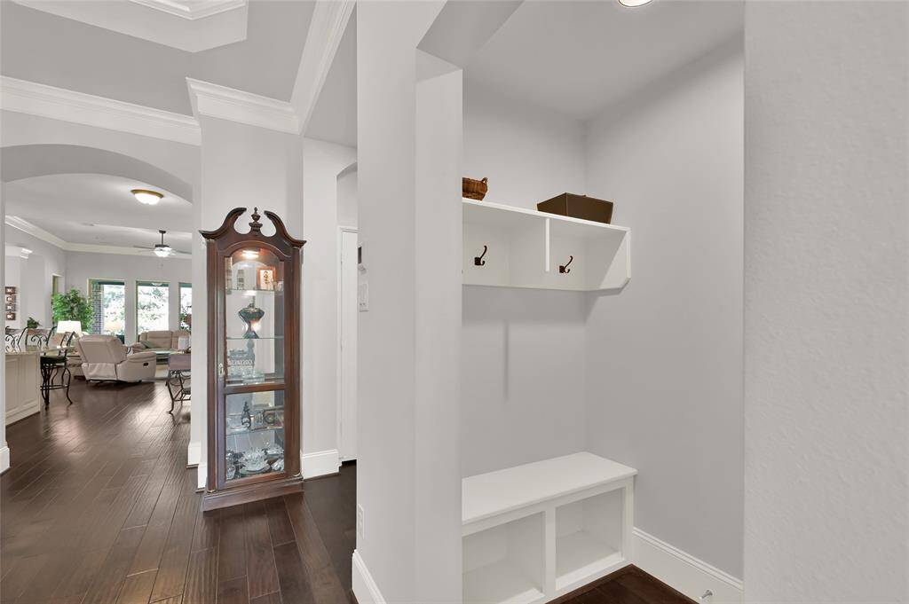 Coming in through the garage, you are met with a built-in bench and storage nook.