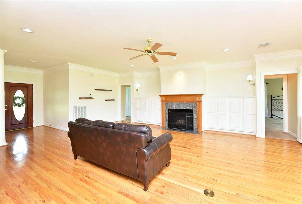 The formal dining is just off the foyer, to the right. This dining room has oak floors and a built in buffet.