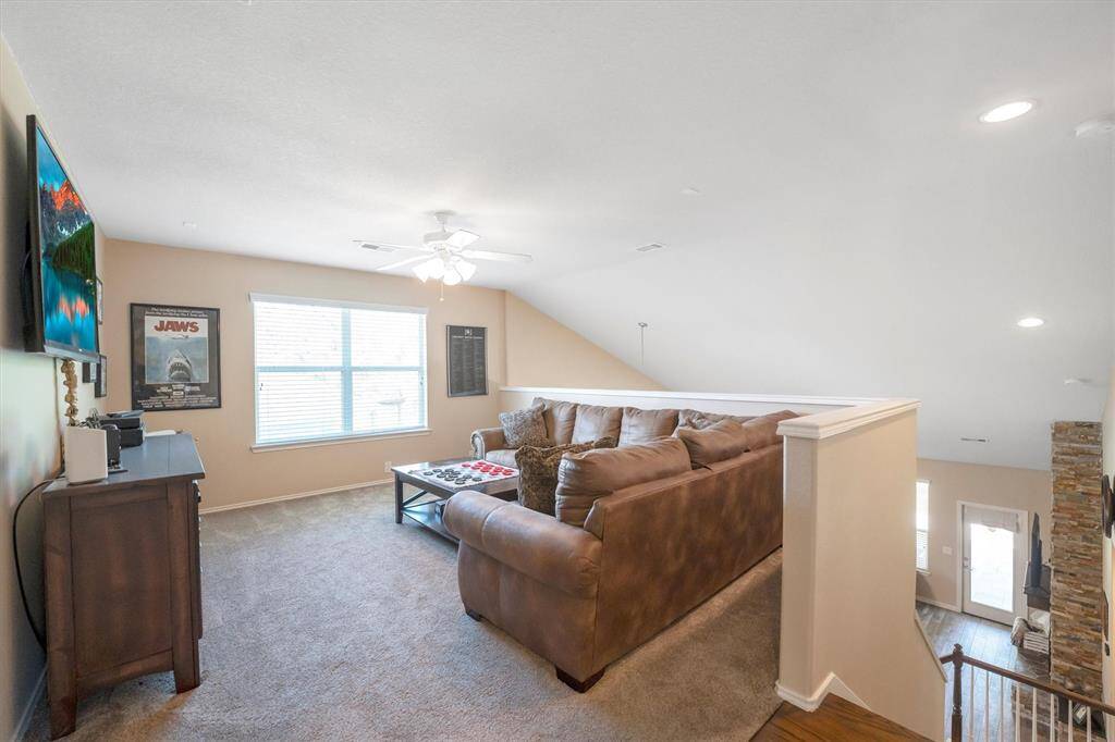 The game room has ample space for a game table, big screen TV, and all the extras, perfect for movie nights, weekend hangouts, and everything in between.