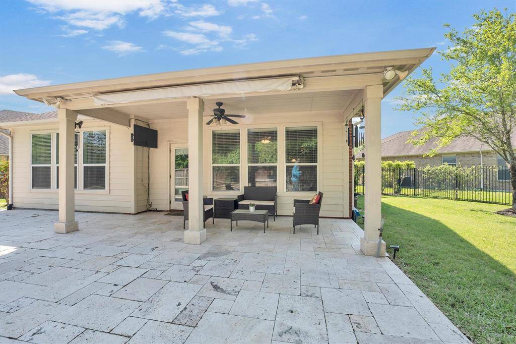 This looks like the perfect setup for summer BBQs and backyard birthday parties, with plenty of room for everyone to gather, relax, and enjoy the good times together. Memories are just waiting to be made out here!