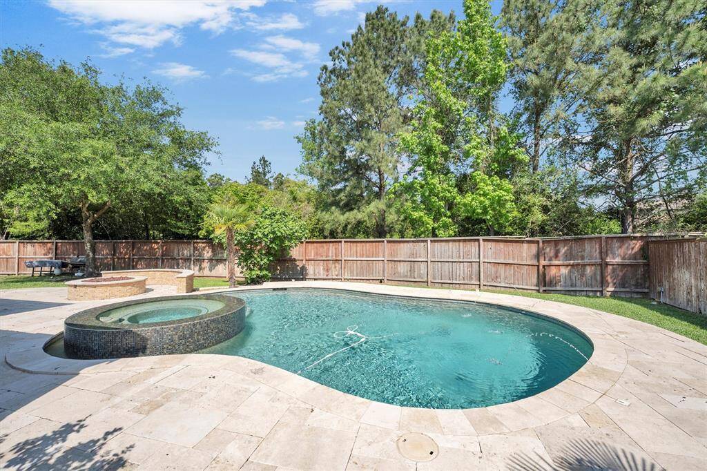Treat yourself to total relaxation in the raised spa, perfectly positioned for a peaceful soak any time of day. Whether you're unwinding after a long day or enjoying a weekend with friends, this backyard retreat brings the spa experience home.