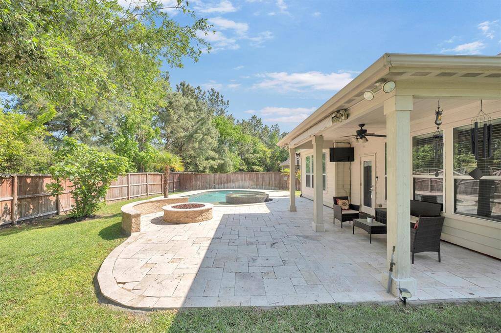 Ahhhh... welcome to the space where daily worries simply melt away. Whether you're lounging by the firepit, enjoying a dip in the pool, or kicking back on the covered patio, this backyard invites you to slow down and savor the moment.