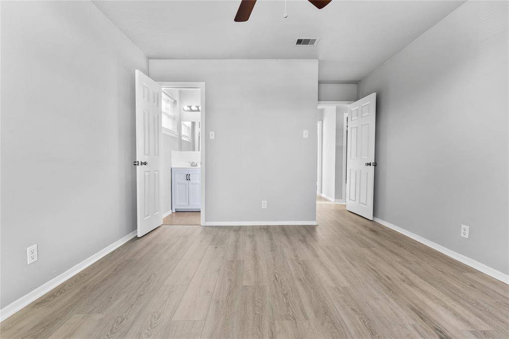 Half bath with vanity. Plenty of space for primary living.