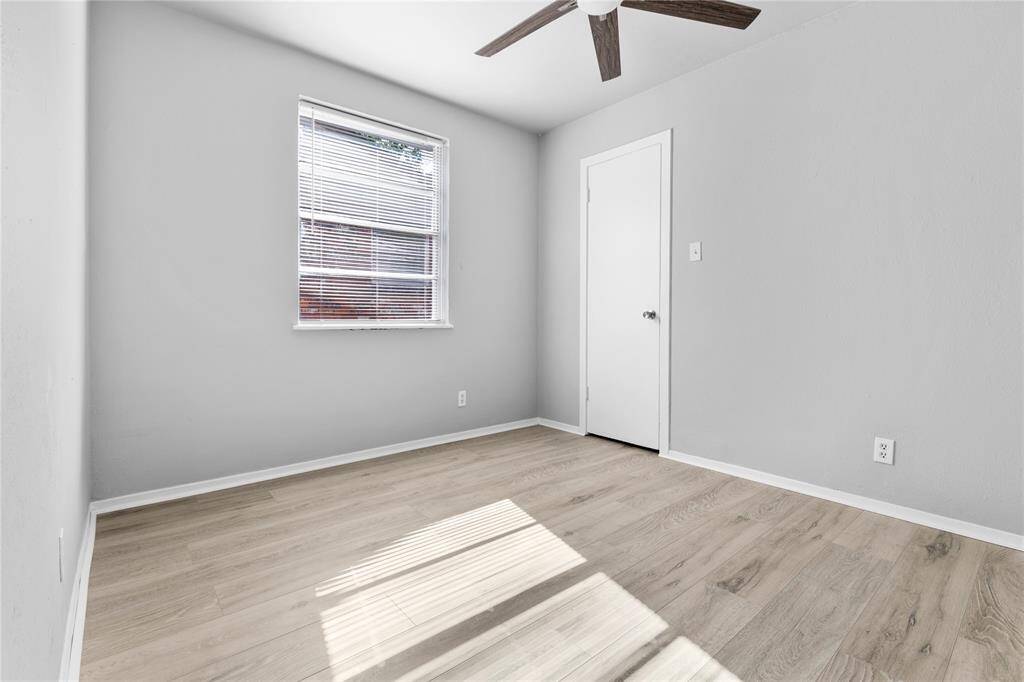 Smallest bedroom also with plenty of natural light and privacy across from the primary bedroom.