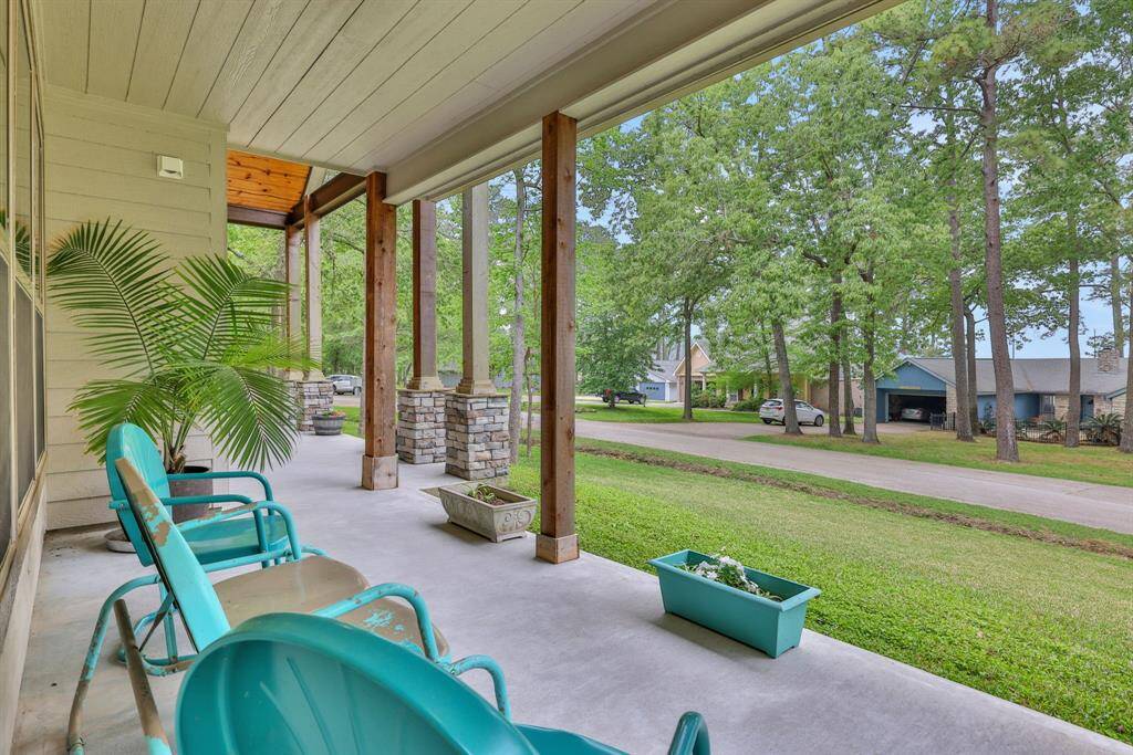 Relax and enjoy the peaceful outdoors from this spacious covered front porch. Perfect for morning coffee or evening relaxation.