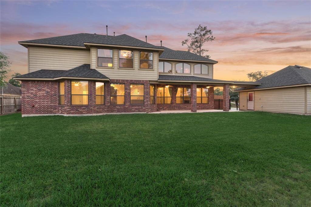 This lovely home is perfectly situated on over a sprawling half-acre lot, offering a multitude of backyard possibilities.