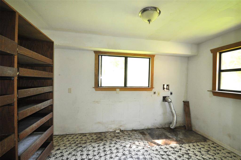 Oversized laundry room at the back of the kitchen.