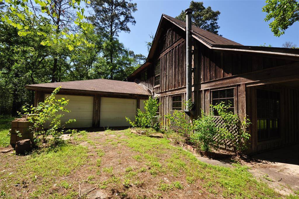 Home offers oversized attached two vehicle garage.