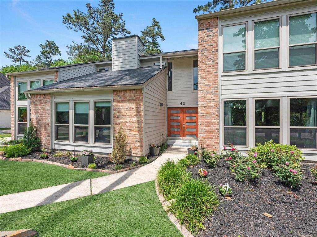 Beautiful home has an oversized lot with lovely landscaping