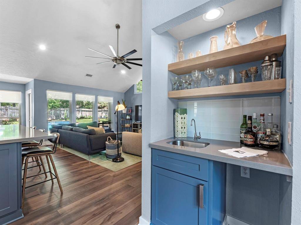 The butlers pantry or wet bar is great for extra storage and you can fit a small beverage fridge here if you like.