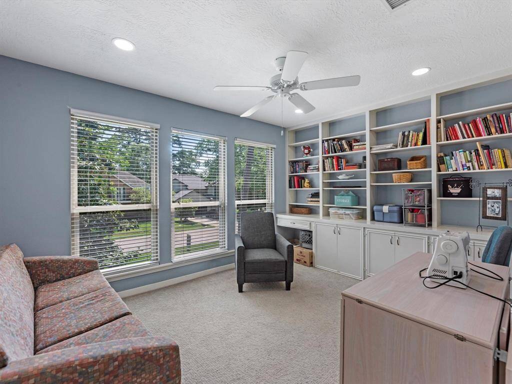 One of the secondary bedrooms upstairs offers great built ins and wonderful closet space