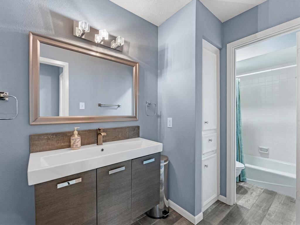 The hall bath upstairs has also been remodeled