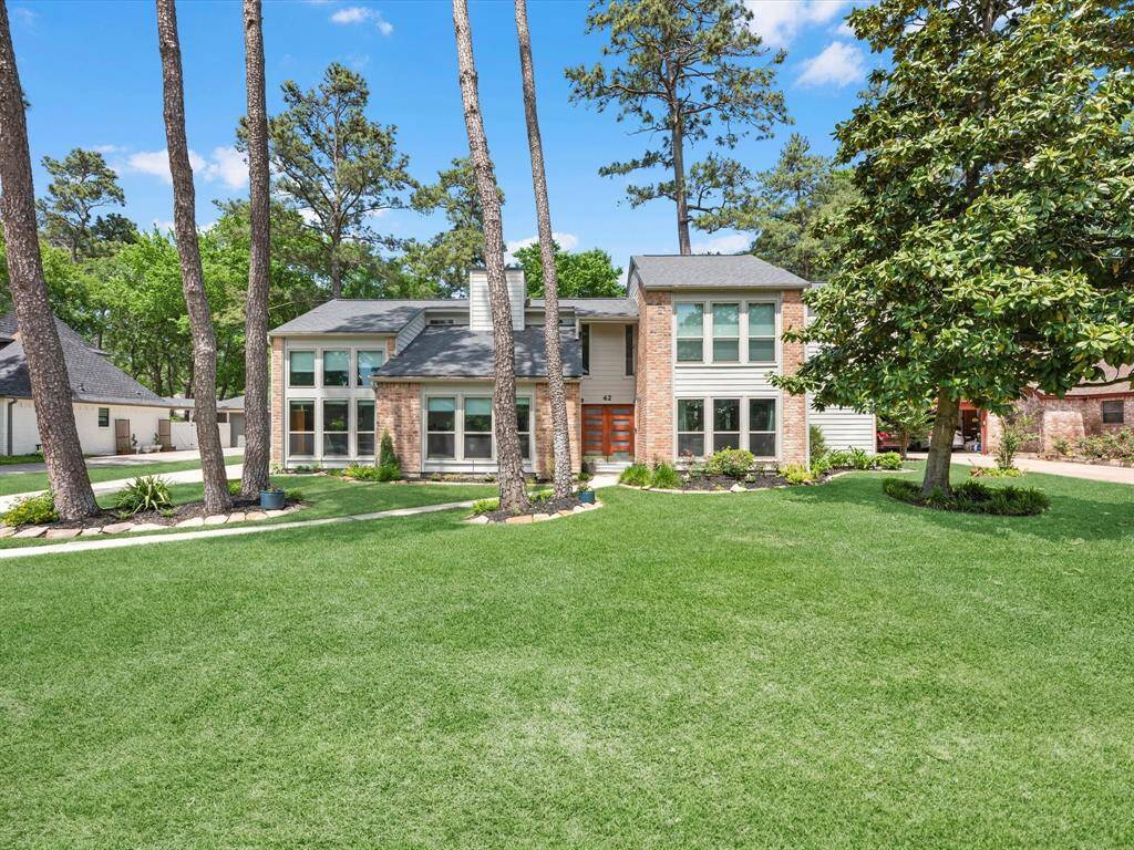 There's a nice long driveway to the detached garage behind the home