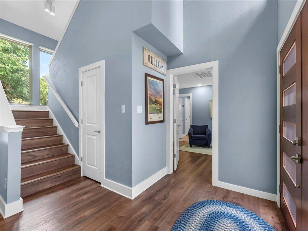 Notice the hard surface floors through the first floor as you enter the home