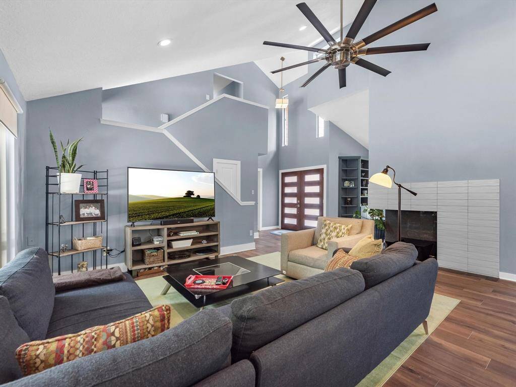 You can see the fireplace that was redone with tile work and gas logs. And the large ceiling fan overhead
