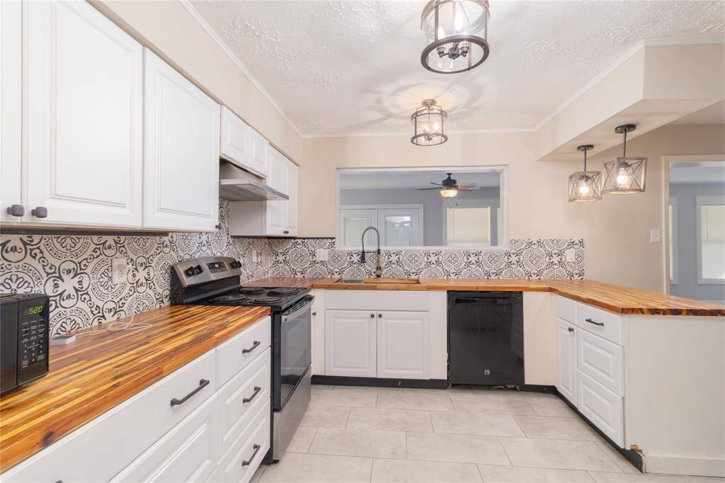 Kitchen open to the living room with plenty of counter space